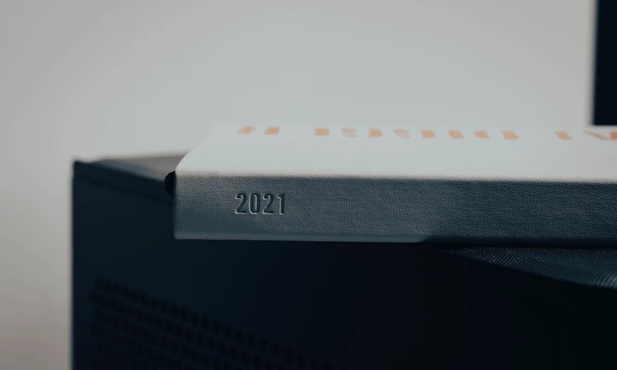 A clean minimalist calendar planner on a desk