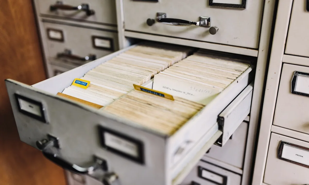 An overflowing filing cabinet showing the chaos of unverified information