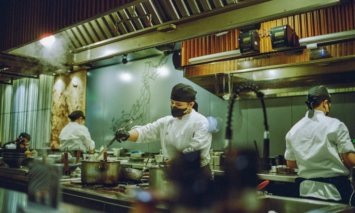 A busy restaurant kitchen during rush hour