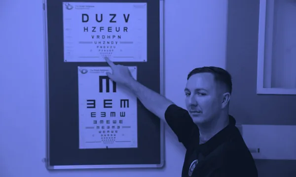 An optical vision test chart, representing the challenge of AI recognizing text through images.