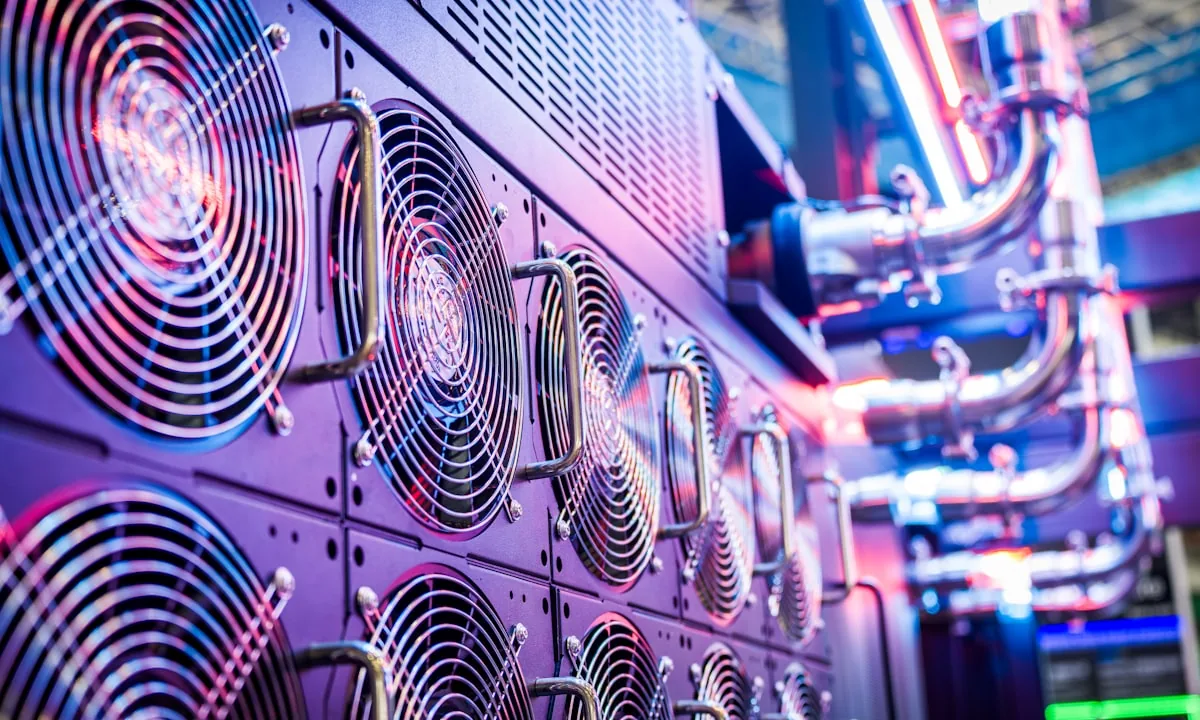Massive rows of glowing servers in a data center