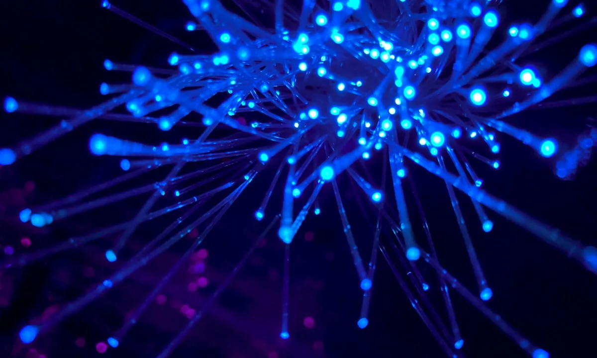 A complex network of glowing server nodes representing exponential token usage