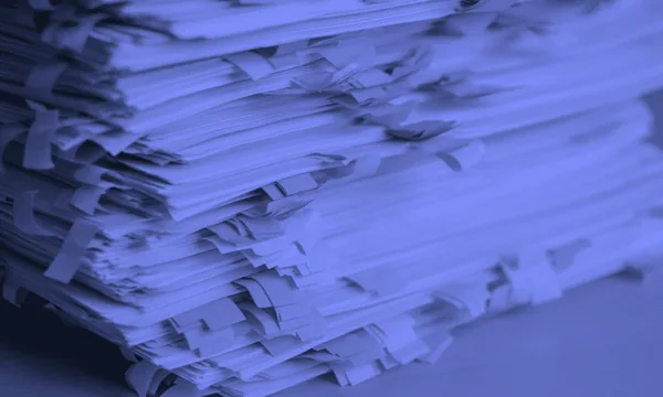 Messy pile of documents representing mental clutter