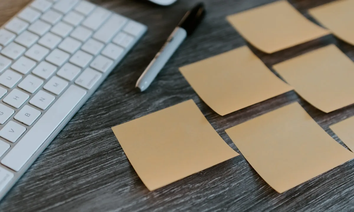A sticky note placed over a computer keyboard