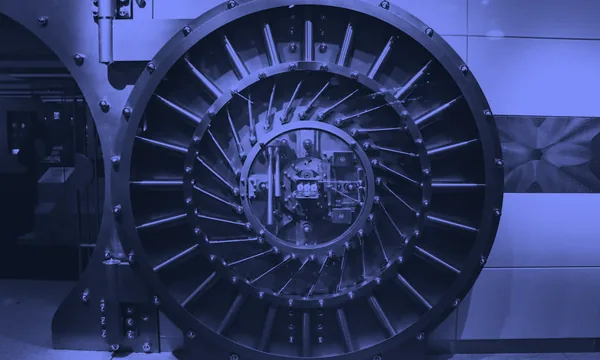 A massive steel vault door swinging open