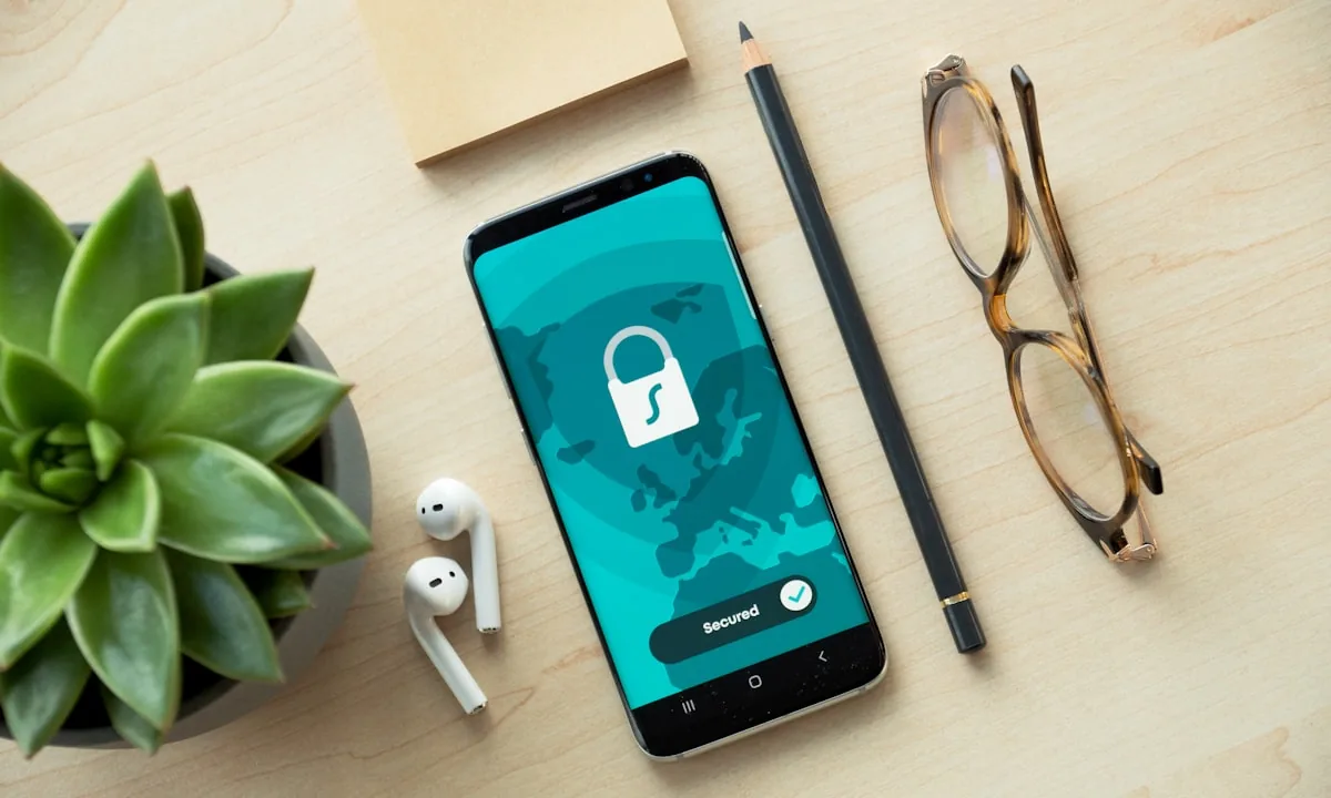 A lock icon on a phone screen representing data privacy.