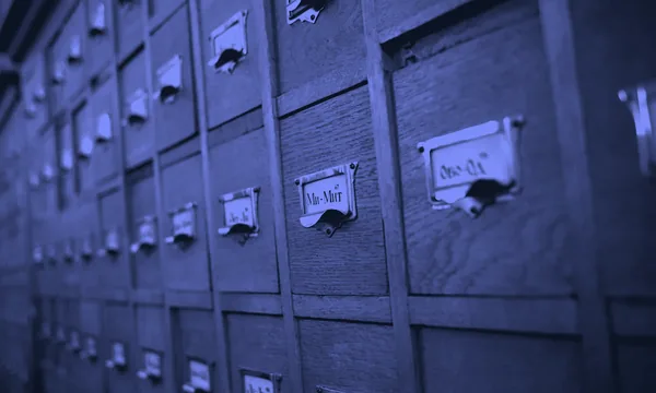 Neatly organized filing cabinets representing structured, machine-readable data