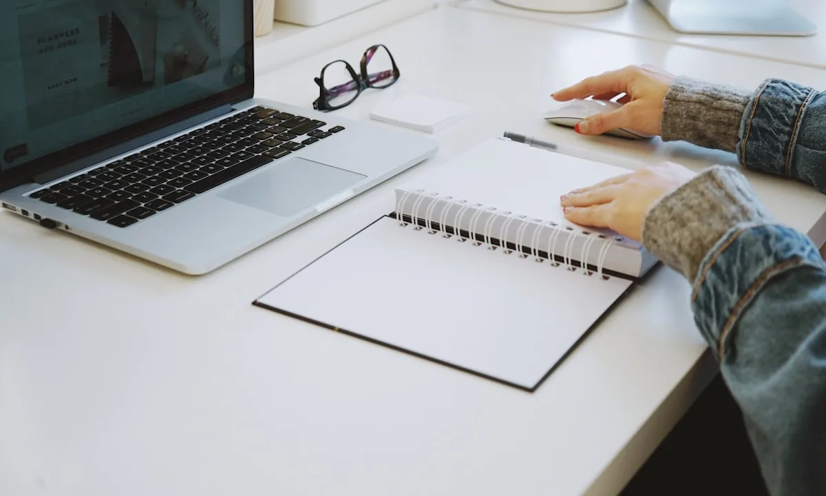 Neat workspace with a notebook focused on grouped tasks