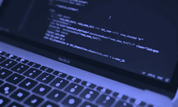 Developer reviewing pull request diff on screen