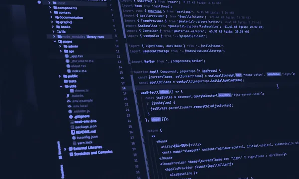 Developer conducting a detailed code review on a monitor